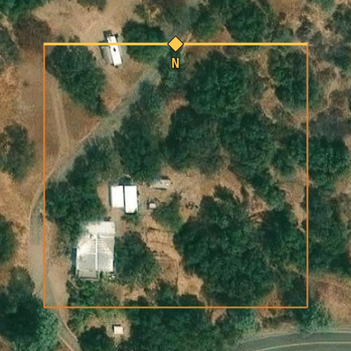 Plain satellite view of the foothill lot, the kind of map view a buyer would pull up online.